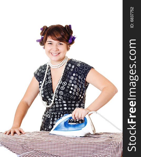 Smiling housewife is ironing a shirt on white background