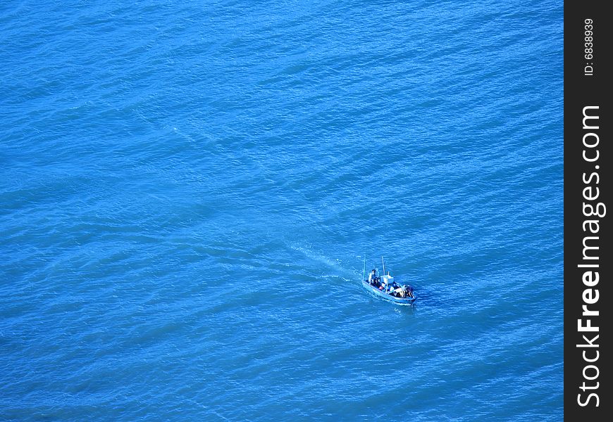 Fishing Boat and Blue Water