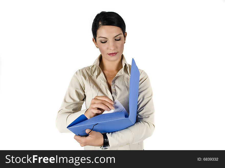 Beautiful business woman checking the papers from a blue folder,more photos with this model in Business people ,laptop and money. Beautiful business woman checking the papers from a blue folder,more photos with this model in Business people ,laptop and money