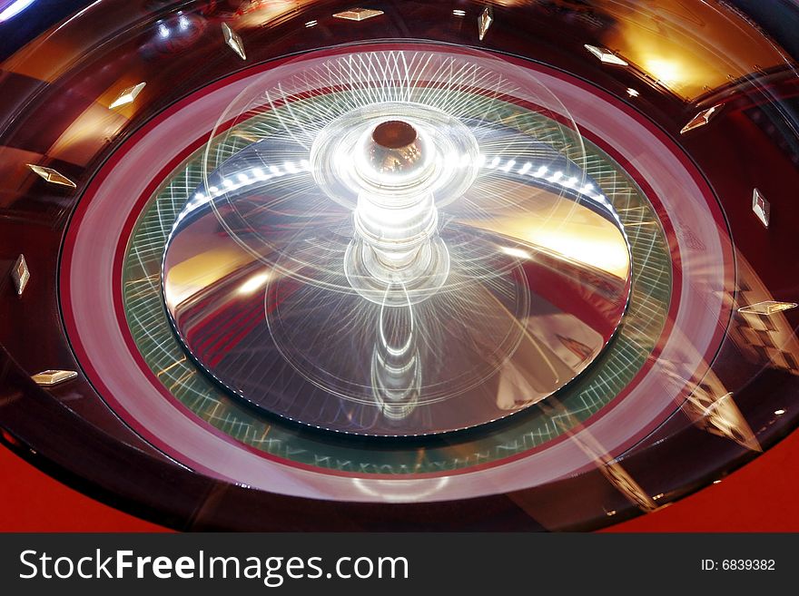 Roulette rotation in a casino.