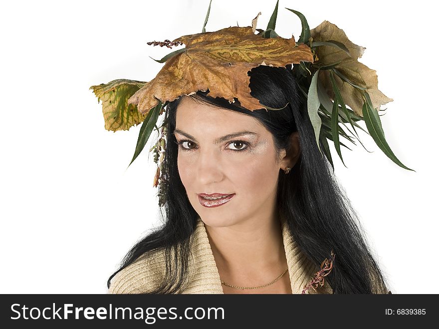 Beautiful women with crown of autumn leafs on head and autumn make-up,more photos with this model in Autumn. Beautiful women with crown of autumn leafs on head and autumn make-up,more photos with this model in Autumn