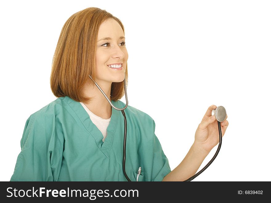 Shot of isolated woman holding up stethoscope to check on somebody. Shot of isolated woman holding up stethoscope to check on somebody