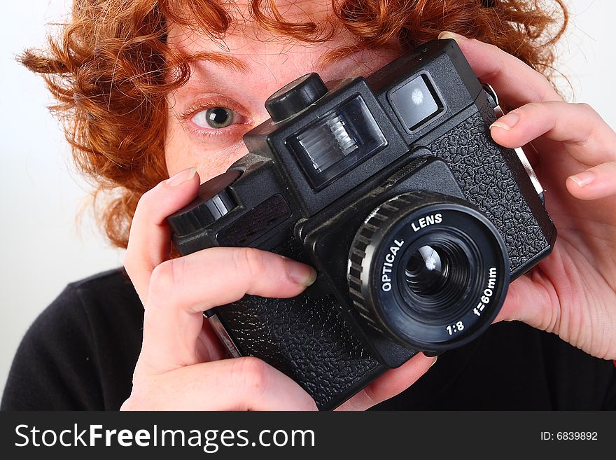 Red head photographer with camera. Red head photographer with camera