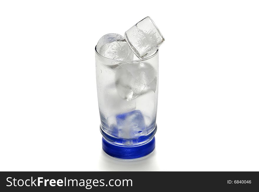 Some ice cubes before melting in a glass