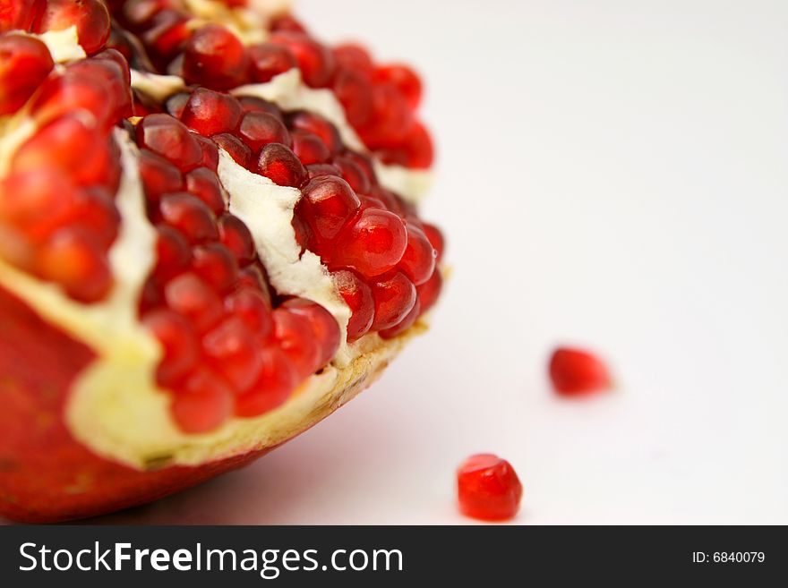 Colorful picture of juicy pomegranate on white background. Colorful picture of juicy pomegranate on white background