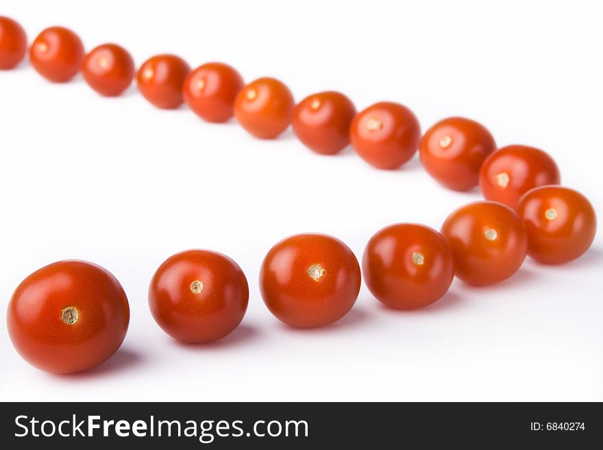 Cherry tomatoes on the white background