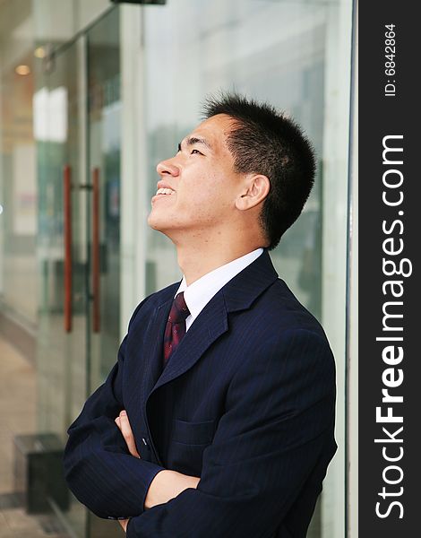 Man Standing In Office Building