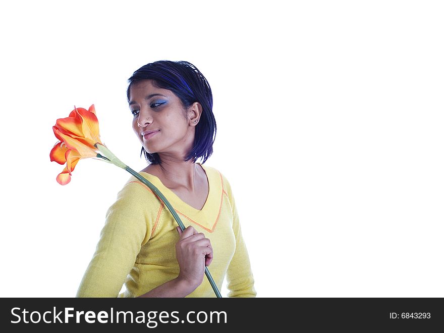Picture of one girl and orange artificial flower on a white background. Picture of one girl and orange artificial flower on a white background