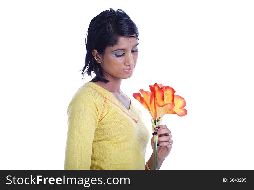 Picture of one girl and orange artificial flower on a white background. Picture of one girl and orange artificial flower on a white background