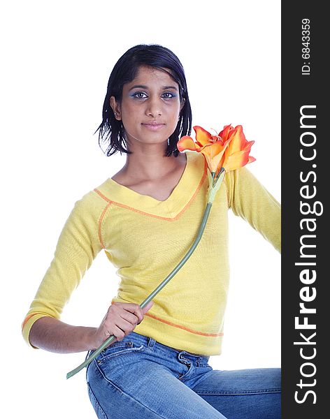 Picture of one girl and orange artificial flower on a white background. Picture of one girl and orange artificial flower on a white background