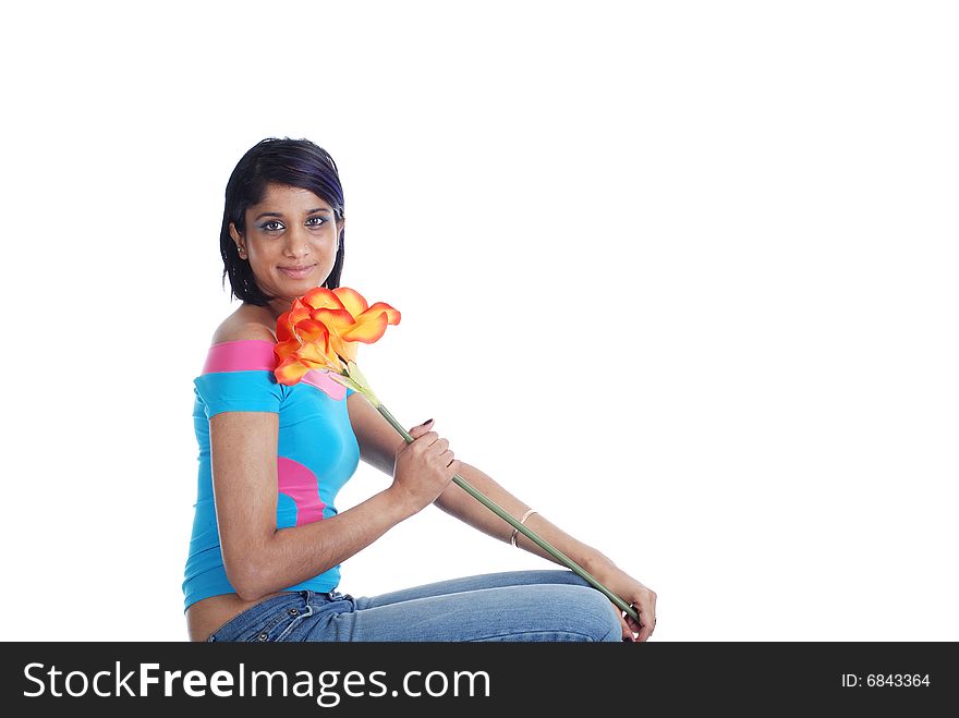 Picture of one girl and orange artificial flower on a white background. Picture of one girl and orange artificial flower on a white background