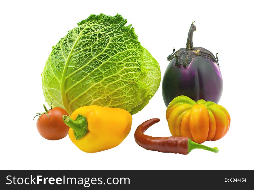 Autumn vegetables Isolated on a white background cabbage, an eggplant, pepper and tomatoes. Autumn vegetables Isolated on a white background cabbage, an eggplant, pepper and tomatoes