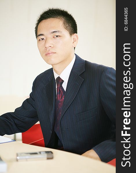 Young asian  business man working in office. Young asian  business man working in office