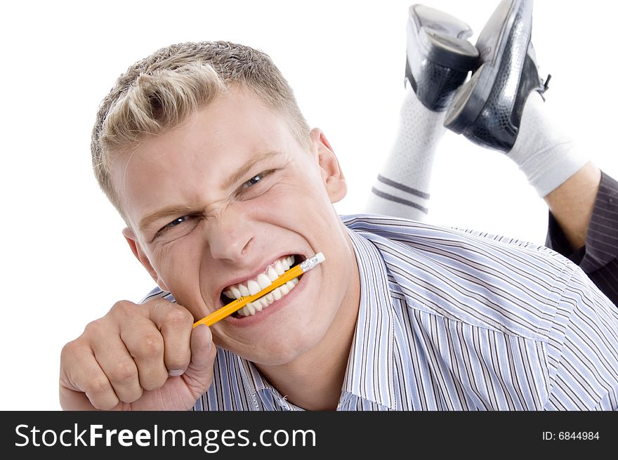 Man holding pencil with teeth with white background