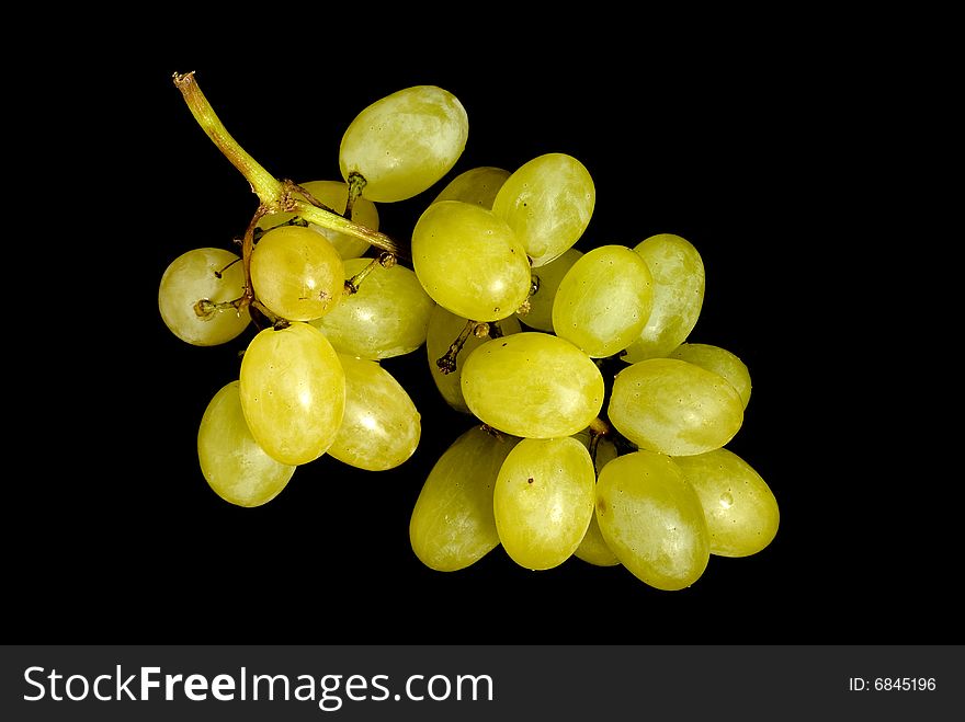 Bunch of seedless grapes over black background. Bunch of seedless grapes over black background