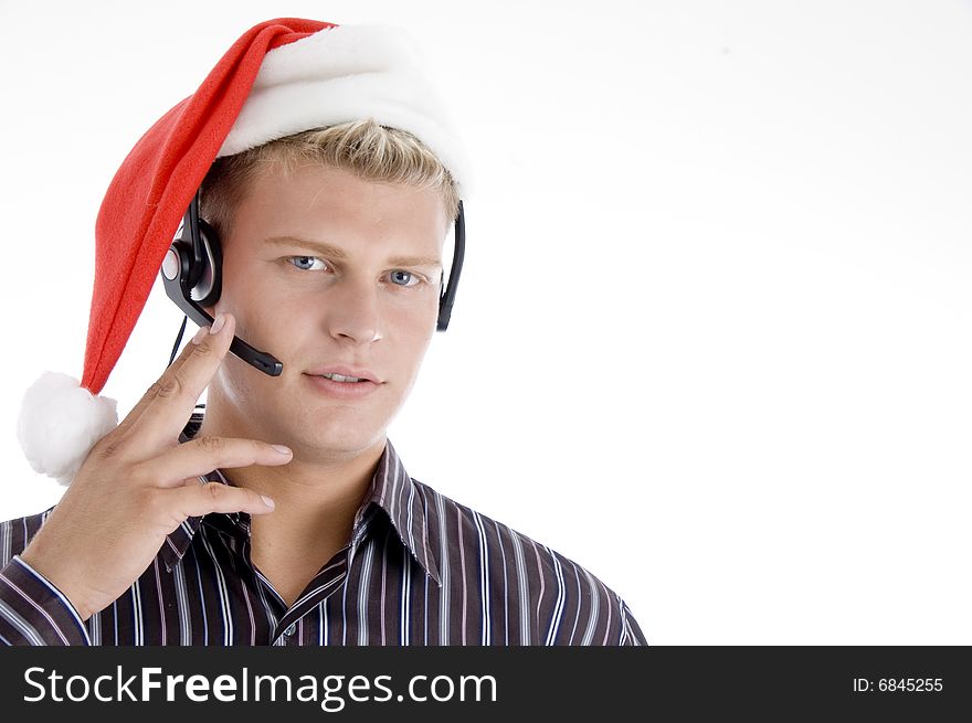 American man wearing headphone and santa hat isolated on white background