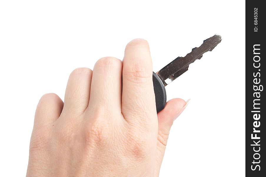 Keys From The Car In A Female Hand. It Is Isolated