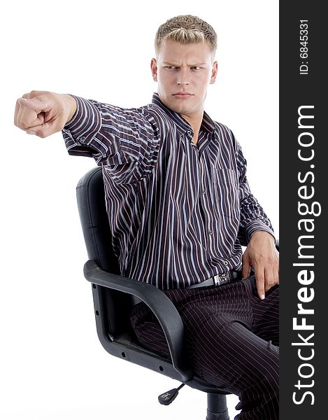 Young american pointing angrily on an isolated white background