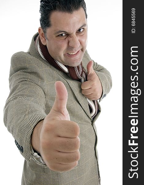 Man showing thumb gesture against white background