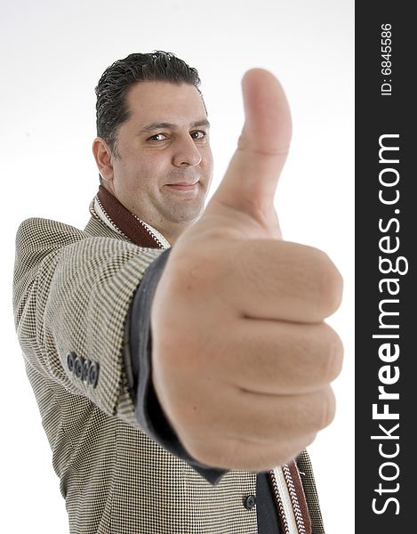 Man showing approval sign against white background