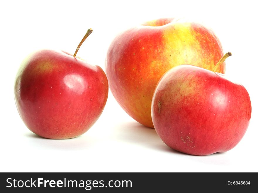 Three ripe apples isolated on white