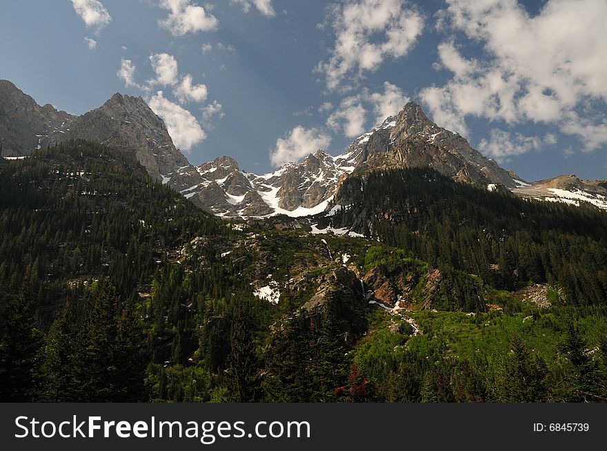 Grand tetons national park maountains covered in snow on a nice spring morning