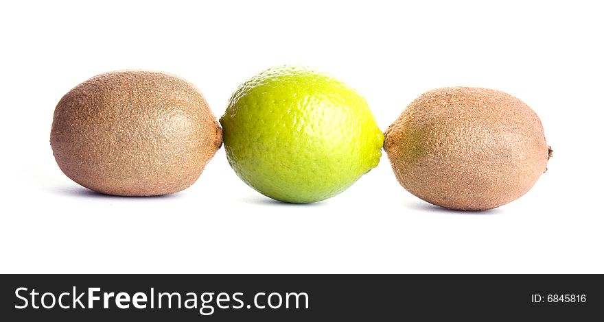 Two Kiwies And Lime Isolated On White