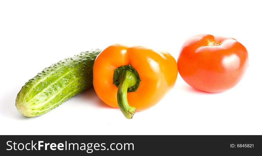 Cucumber, Pepper And Tomato Isolated On White