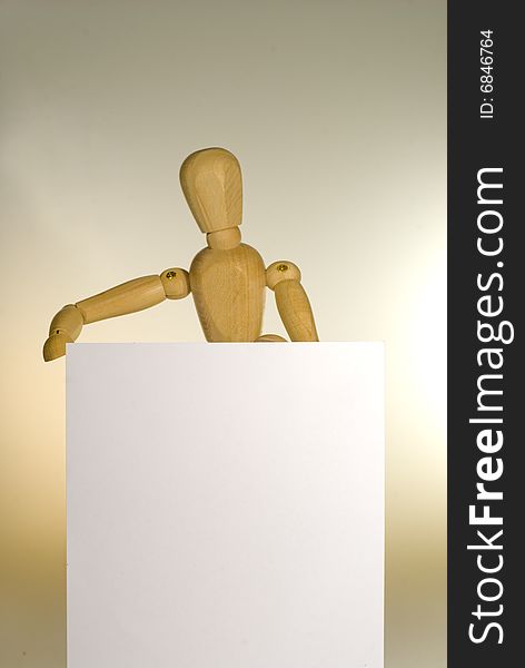 A shot of a jointed Doll showing a blank sign