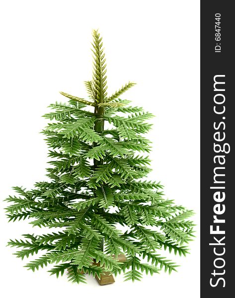 Plastic fur-tree on a white background isolated
