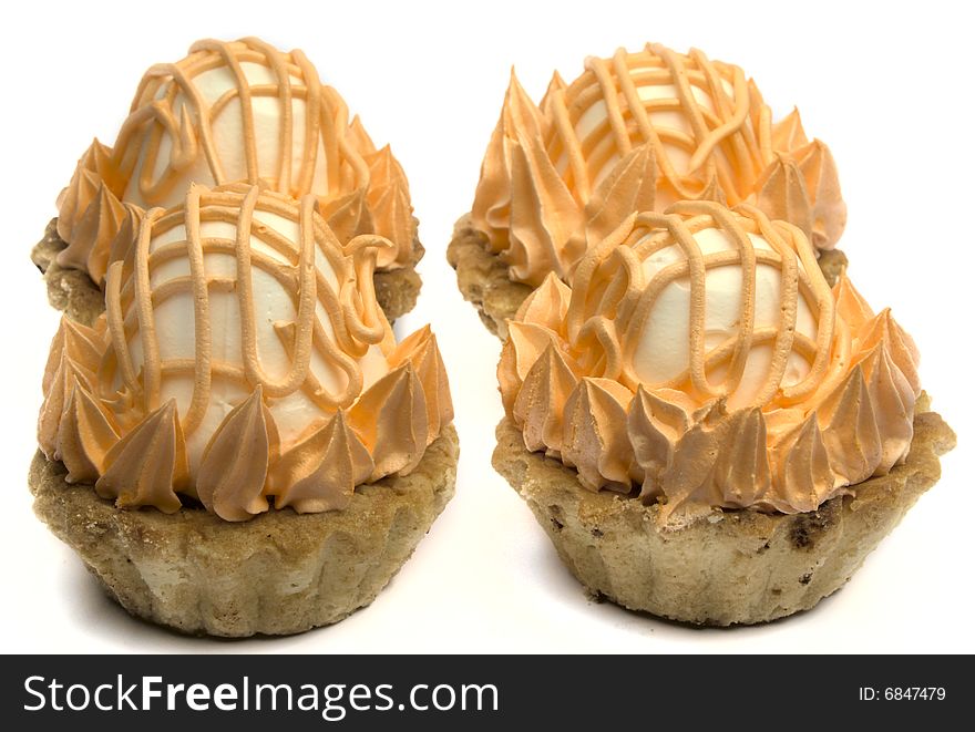 Four cake with a zephyr isolated on a white background