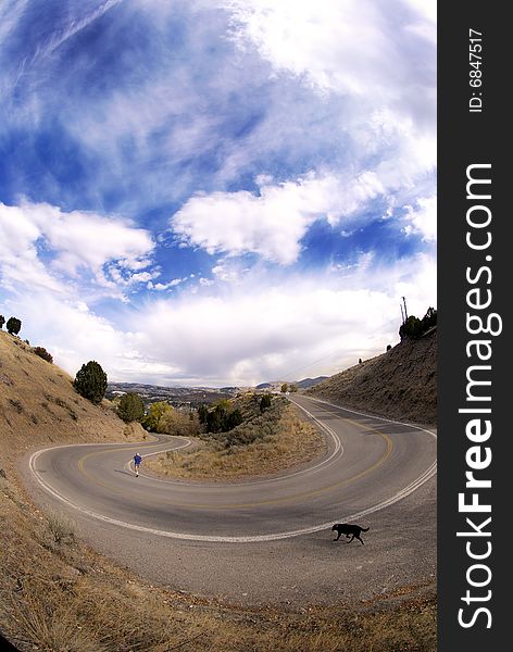 Country road with painted double yellow lines and big curve or turn. Country road with painted double yellow lines and big curve or turn