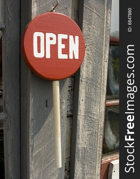 Store open sign on a candy cane form. Store open sign on a candy cane form.