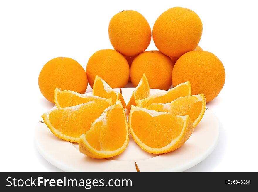 Orange pieces put together with fresh orange. Orange pieces put together with fresh orange.