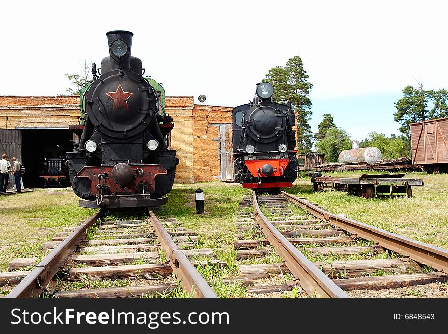 Two russian black steam locomotives. Two russian black steam locomotives