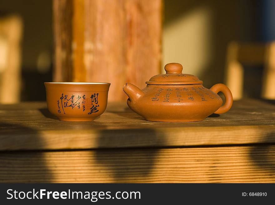 The ceramic pot with cup. The ceramic pot with cup