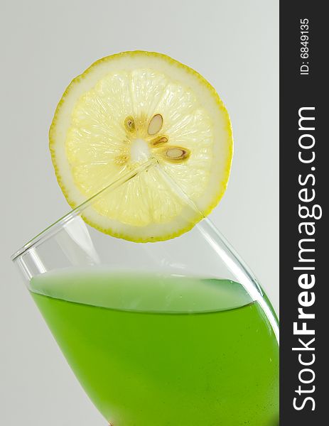 Kiwi Fruit Juice in the glass with a lemon. Kiwi Fruit Juice in the glass with a lemon