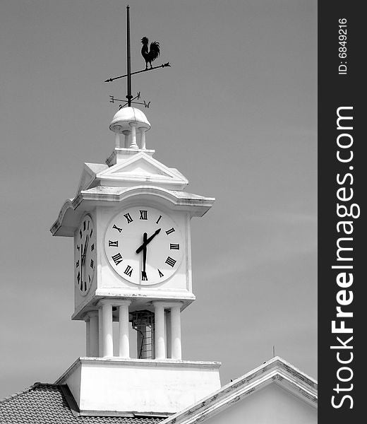 Clock tower with cock wind vane