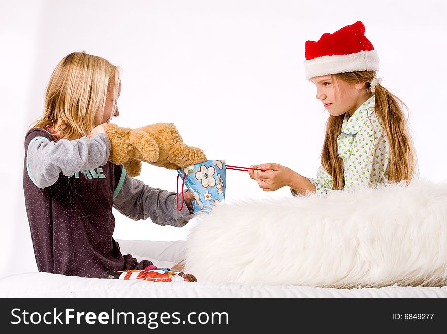 Two children having a fight about the present. Two children having a fight about the present