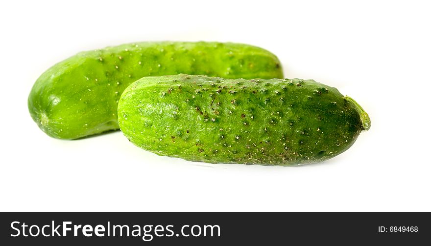 One pair of green cucumbers. One pair of green cucumbers.