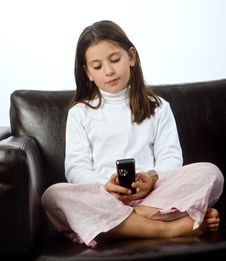 Young Girl And Cell Phone Royalty Free Stock Image Young Girl And Cell Phone Royalty Free Stock Image