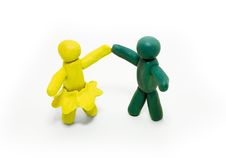 Two Clay Figures Dancing Stock Photography
