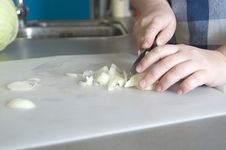 Soup  Preparation: Woman Slice Onion Royalty Free Stock Photography