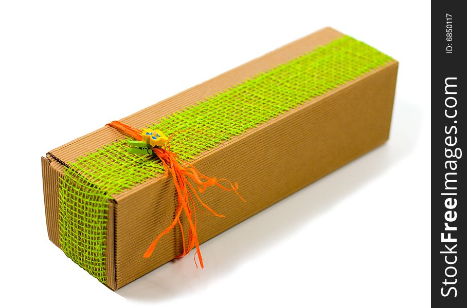 Cardboard gift box with colorful decoration on white background