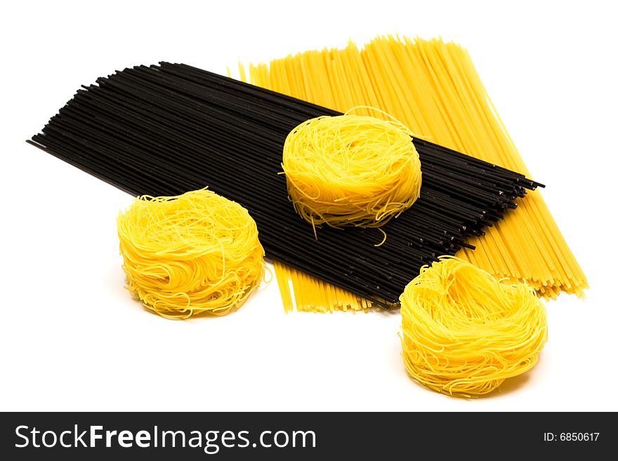 Different beautiful pasta on a white background