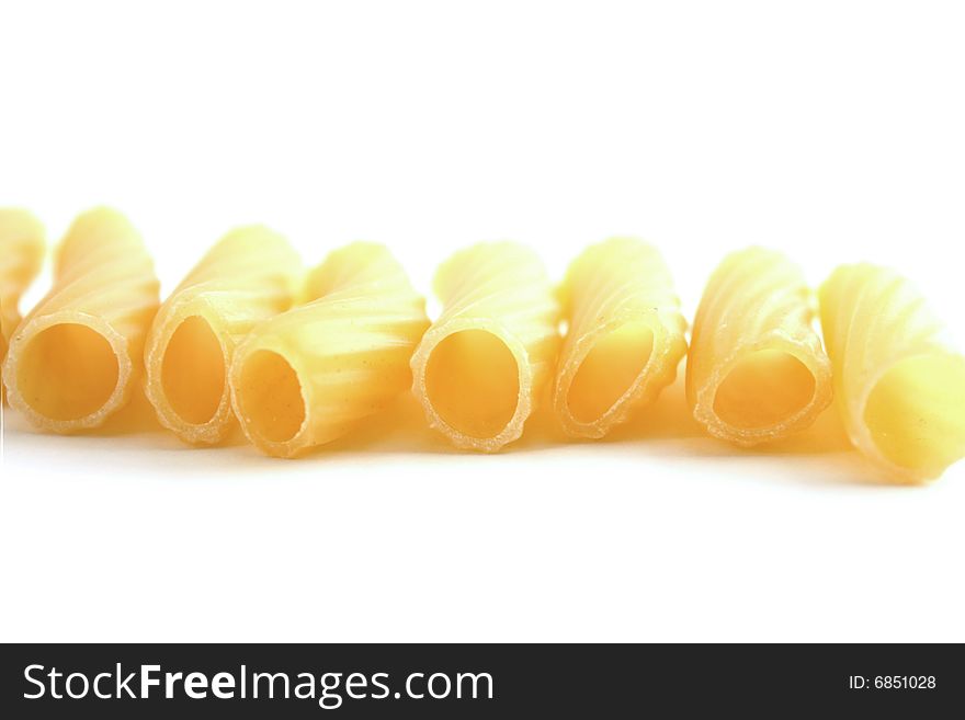 Pasta rigatoni isolated on a white background