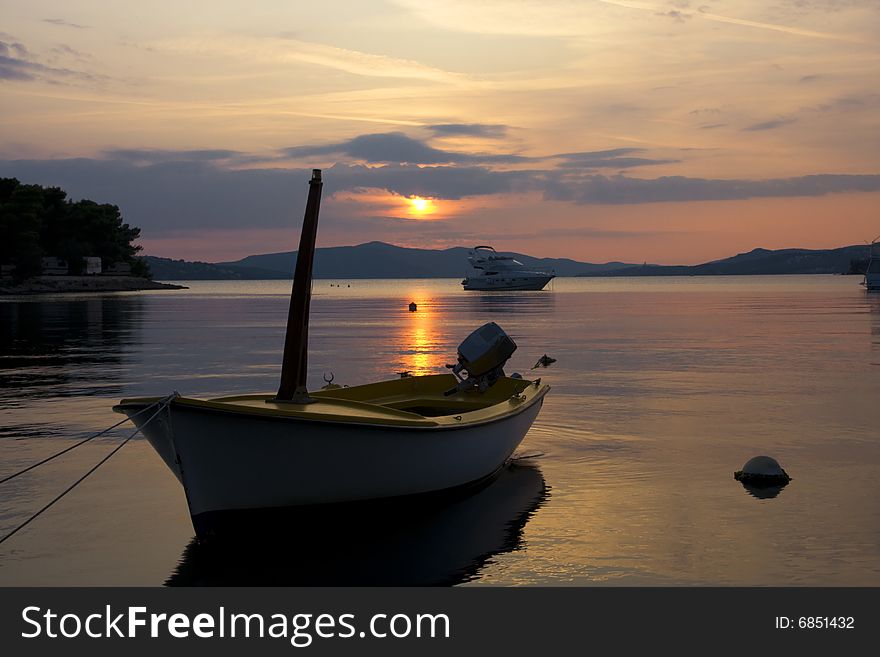 Boat In The Rays Of Sunset