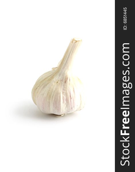 A garlic clove isolated on a white background