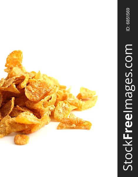A heap on cornflakes isoltaed on a white background