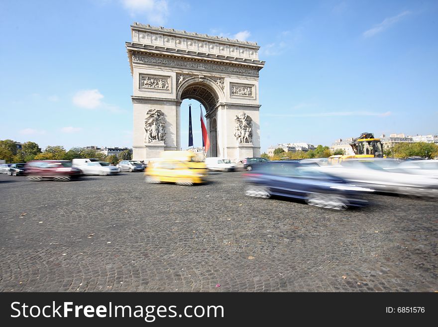 Moving traffic at the Arc de Triomphe, Paris, France